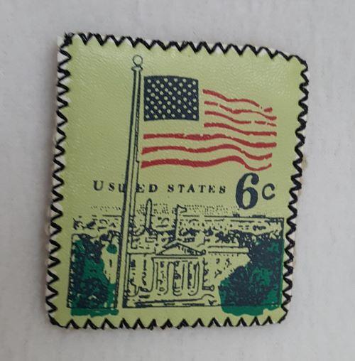 etichetta decorativa a forma di francobollo